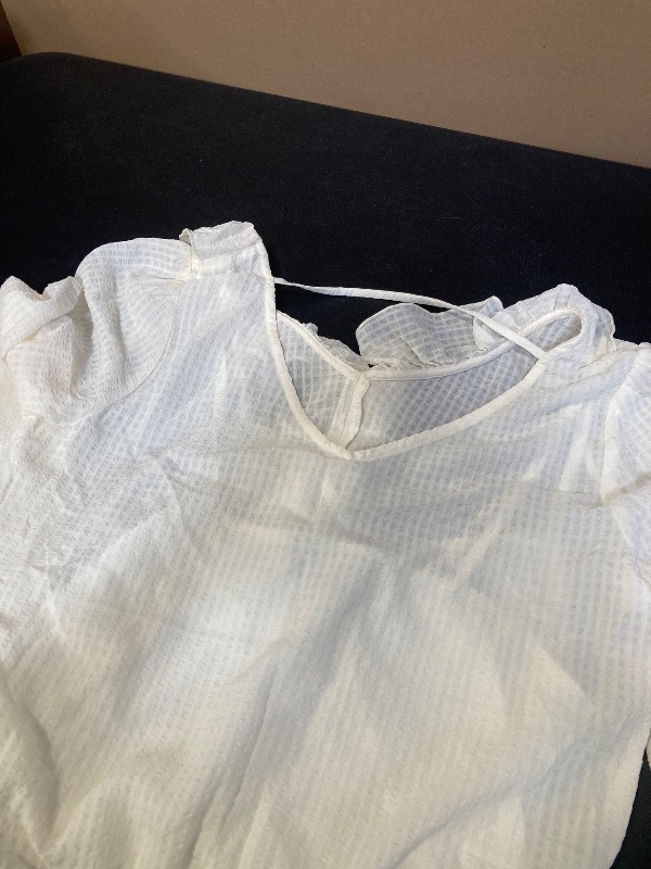 Photo 1 of SIZE MEDIUM- WOMENS IVORY RUFFLED TOP