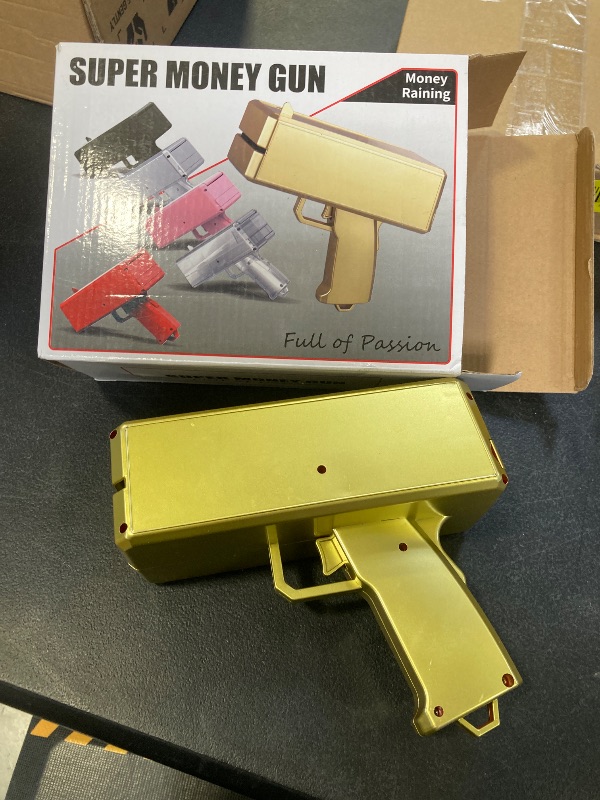 Photo 1 of Alagoo Super Money Guns Paper Playing Spary Gun Make it Rain Toy Gun, Handheld Cash Fake Bill Dispenser Shooter Toy(Metallic Gold)