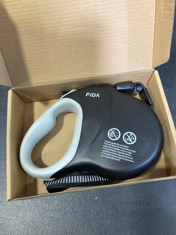 Photo 1 of Fida Upgraded Retractable Dog Leash 30ft, Heavy Duty Pet Walking Leash for Medium/Large Breed up to 110 lbs, 360° Tangle-Free Long Retract Dog Lead, Soft Grip, One-Hand Brake, Black