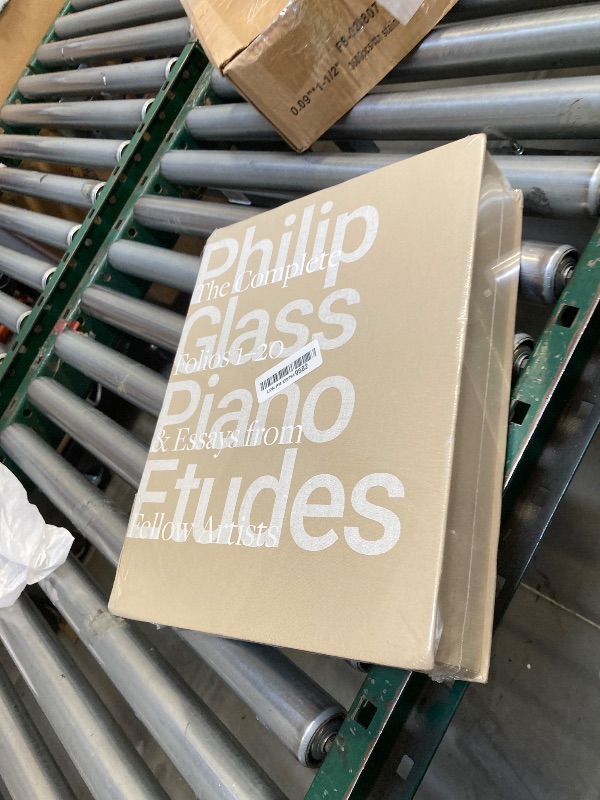 Photo 1 of 
Philip Glass Piano Etudes: The Complete Folios 1-20 & Essays from 20 Fellow Artists Hardcover – November 7, 2023
