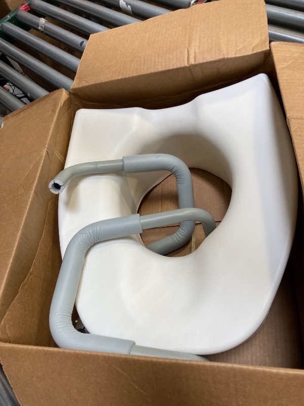 Photo 1 of  Medline 5" Elongated Raised Toilet Seat, with Lock and Removable Padded Arms- A Medical Seat for Seniors, Elderly, Adults, or Post-Surgery Recovery, 1 Ct. 