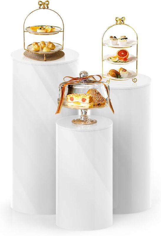 Photo 1 of White Cylinder Pedestal Stands - 3 Pieces - White Party Cylinder Table for Wedding Party or Babyshower - Party Decor - 35.4''(L),29.5''(M),23.6''(S)