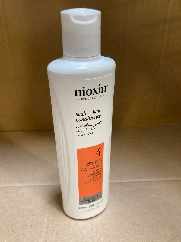 Photo 1 of Nioxin System 4 Scalp + Hair Conditioner | For Colored or Damaged Hair with Progressed Thinning | With Niacinamide and Biotin | 10 Fl oz.