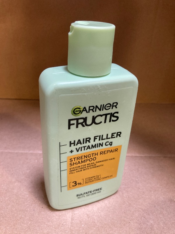Photo 1 of Garnier Fructis Hair Filler Strength Repair Shampoo with Vitamin Cg, Sulfate Free Shampoo for Weak, Damaged Hair, 10.1 Fl Oz, 1 Count
