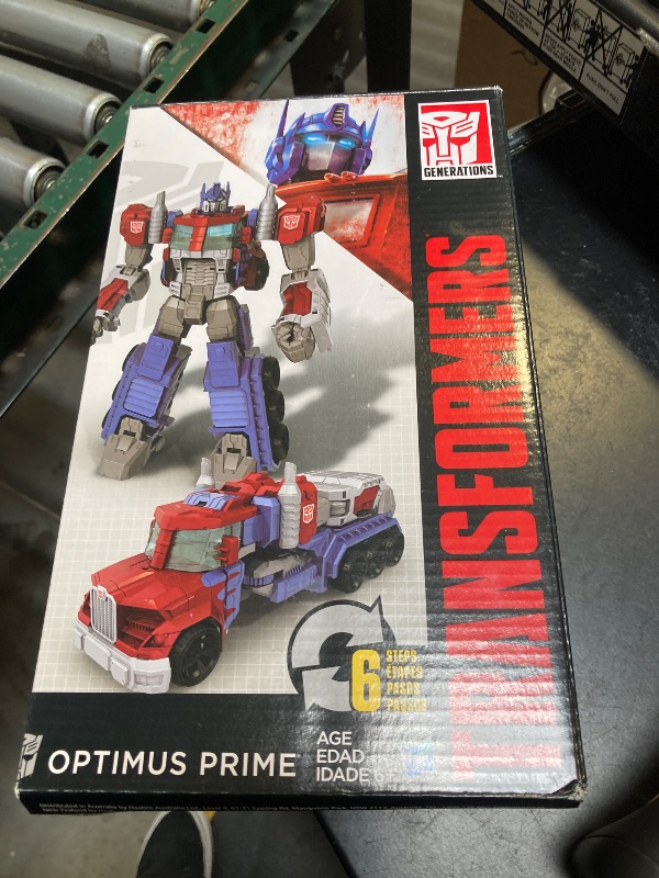 Photo 1 of Transformers Toys Heroic Optimus Prime Action Figure - Timeless Large-Scale Figure, Changes into Toy Truck - Toys for Kids 6 and Up, 11-inch (Amazon Exclusive)