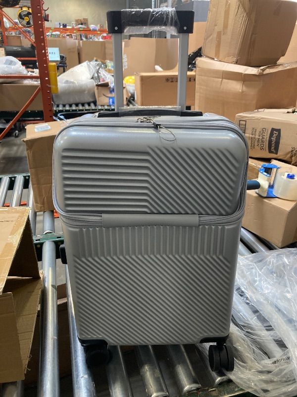 Photo 1 of Rolling Suitcase, Silver, 20 Inch 