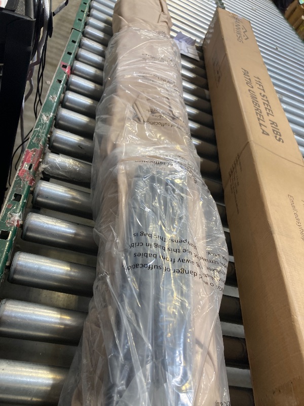 Photo 1 of ABCCANOPY 9FT Outdoor Patio Umbrella, 8 Ribs Table Umbrella w/Crank for Easy Set Up, Suitable for Garden, Lawn, Deck & Backyard (Turquoise)
