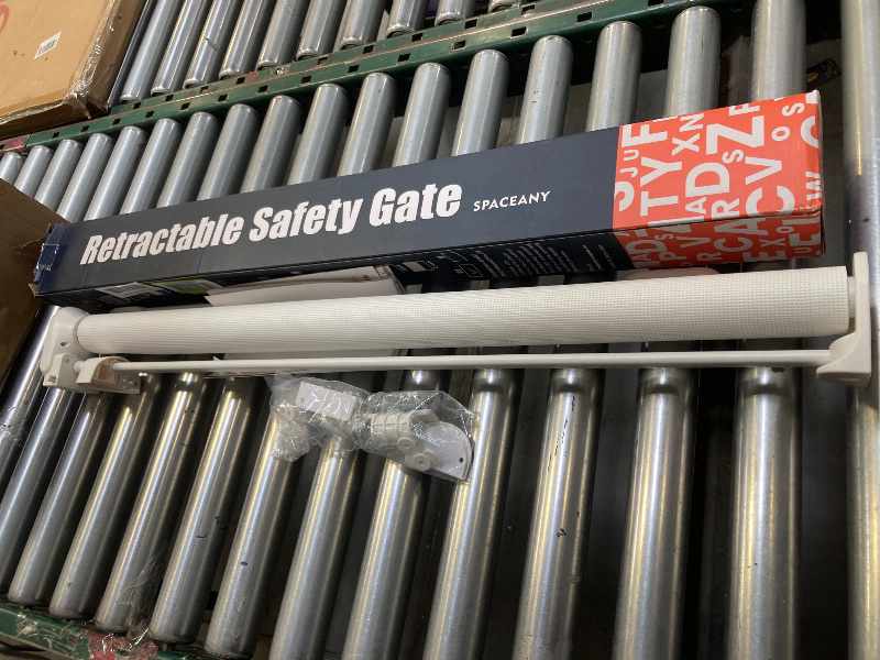 Photo 1 of  White Retractable  Gate 

