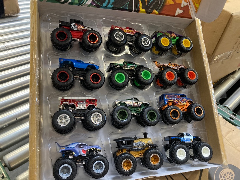Photo 1 of Hot Wheels Monster Trucks, Set of 12 1:64 Scale Die-Cast Toy Trucks for Kids and Collectors, Styles May Vary (Amazon Exclusive)