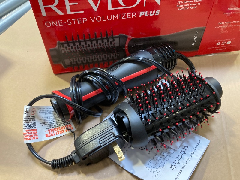 Photo 1 of REVLON One Step Volumizer PLUS Hair Dryer and Styler - More Volume, Less Damage, and More Styling Control for Easy and Fast Salon-Style Blowouts, Plus Travel Friendly (Black)