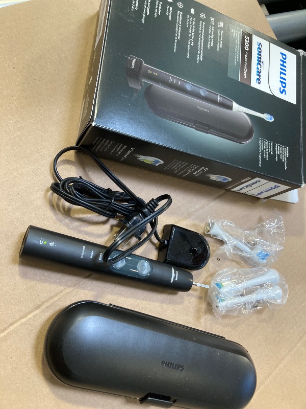 Photo 1 of Philips Sonicare ProtectiveClean 5300 Rechargeable Electric Toothbrush, with Pressure Sensor, 3 Cleaning Modes, SmarTimer and QuadPacer, with 2 Bonus Brush Heads, Travel Case, Black, Model HX6423/34