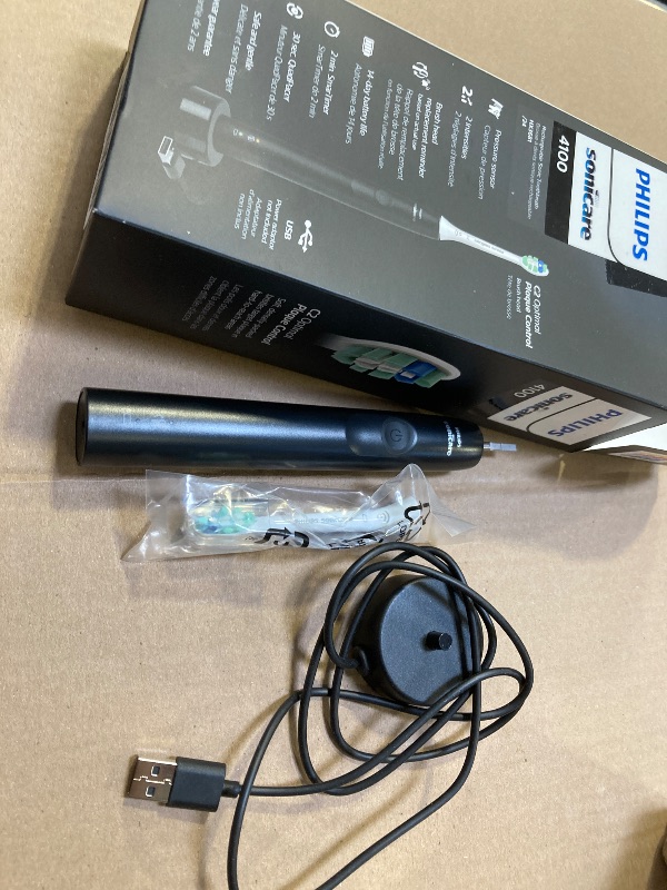 Photo 1 of Philips Sonicare 4100 Rechargeable Electric Toothbrush, with Pressure Sensor, 2 Intensity Settings, SmarTimer and QuadPacer, 14-Day Battery Life, Black, Model HX3681/24