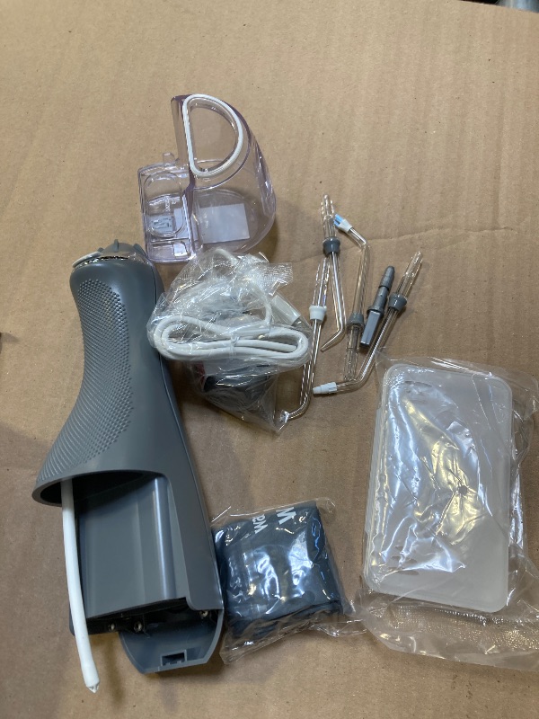 Photo 1 of Waterpik Cordless Advanced 2.0 Water Flosser For Teeth, Gums, Braces, Dental Care With Travel Bag and 4 Tips, ADA Accepted, Rechargeable, Portable, and Waterproof, Grey 