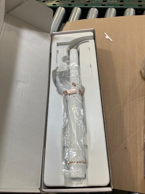 Photo 1 of T3 SinglePass Curl X Extra-Long Barrel Curling Iron with 9 Heat Settings and Ceramic Barrel for Fast Styling and Lasting Results on All Hair Types