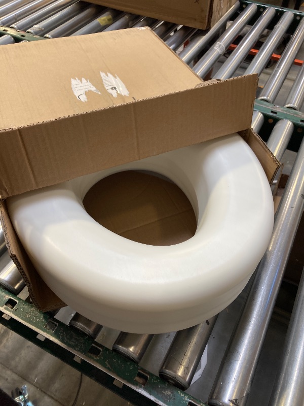Photo 1 of Carex Toilet Seat Riser, Elongated Raised Toilet Seat Adds 3.5 Inches to Toilet Height, for Assistance Bending or Sitting, 300 Pound Weight Capacity T
