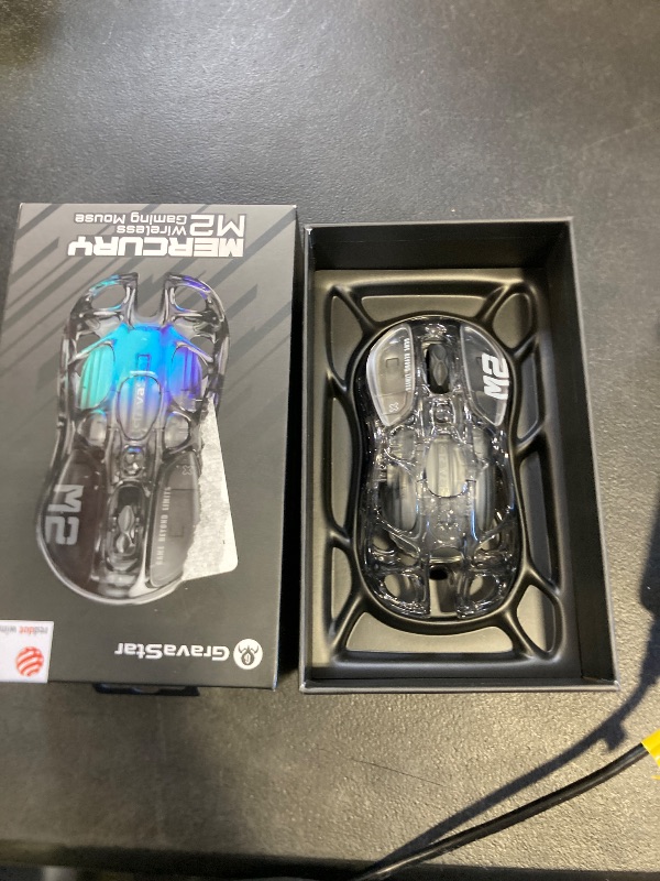 Photo 1 of GravaStar Mercury M2 Wireless Gaming Mouse with 26,000 DPI, PAW3395DM Sensor -79g Lightweight Hollowed-Out Design -5 Programmable Buttons -5 Dynamic Lightsync RGB - Transparent Black