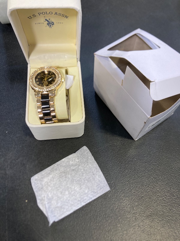 Photo 1 of U.S. Polo Assn. Women's Gold-Tone Watch with Black Dial and Crystal Bezel – Two-Tone Link Bracelet Quartz Analog Timepiece Fits Wrists 5.5"-8" with 40mm Case in Gift-Box