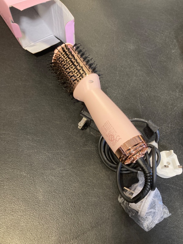 Photo 1 of Ariellagou Dual Voltage Travel Hair Dryer Brush Mini Hot Air Brush with European Plug One Step Blow Dryer and Styler Volumizer for Home and Salon Use