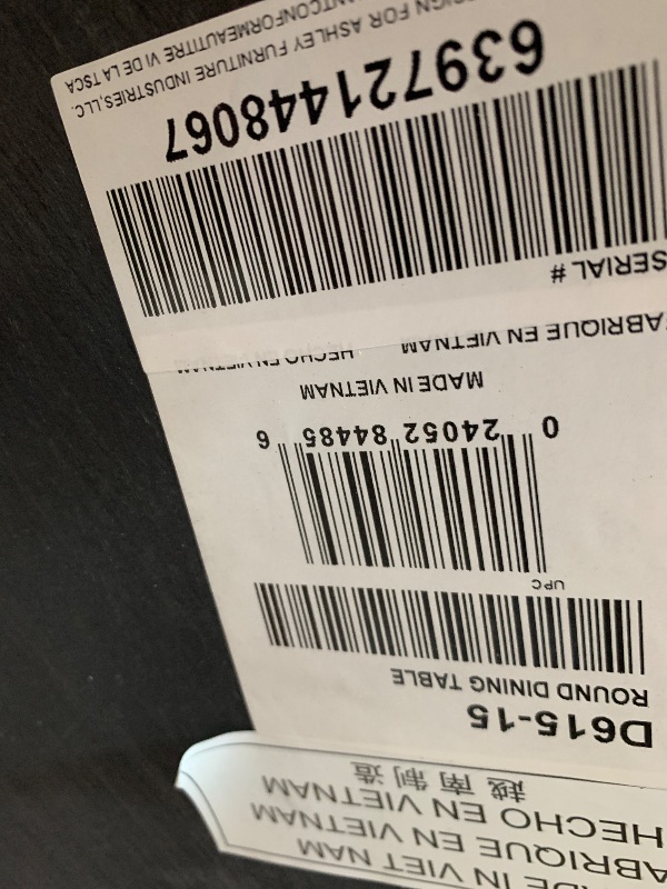 Photo 1 of *************MISSING PARTS****************
Signature Design by Ashley Lyncott Traditional Round Dining Room Table, Seats up to 4, Brown