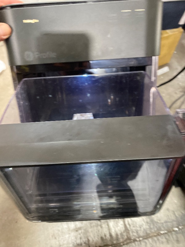 Photo 1 of **************Side tank was missing and top panel is damaged/coming off***************
GE Profile Opal 2.0 XL with 1 Gallon Tank, Chewable Crunchable Countertop Nugget Ice Maker, Scoop included, 38 lbs in 24 hours, Pellet Ice Machine with WiFi & Smart Con