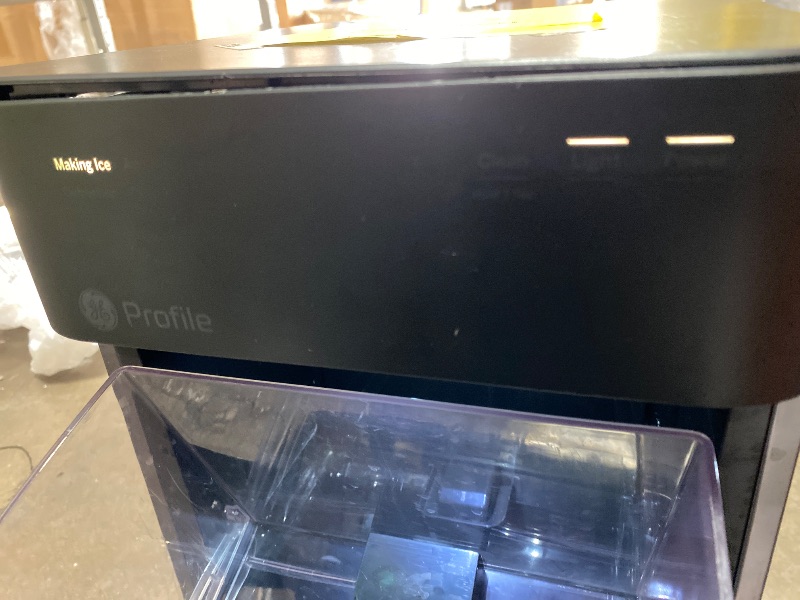 Photo 1 of **************Side tank was missing and top panel is damaged/coming off***************
GE Profile Opal 2.0 XL with 1 Gallon Tank, Chewable Crunchable Countertop Nugget Ice Maker, Scoop included, 38 lbs in 24 hours, Pellet Ice Machine with WiFi & Smart Con