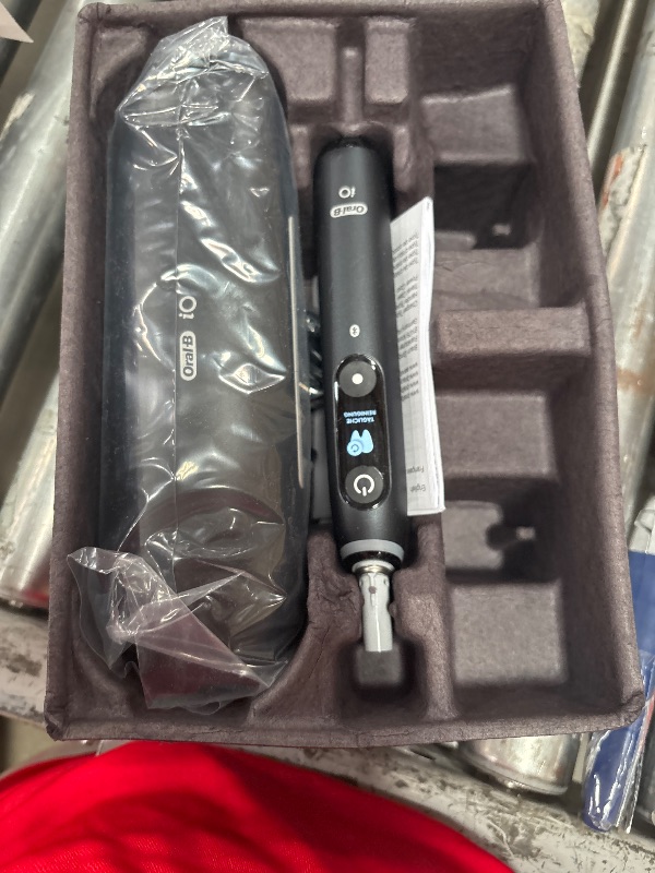 Photo 1 of ***INLUDES EVERYTHING BUT MISSING BRUSH HEADS****
Oral-B iO Deep Clean + Protect Rechargeable Electric Toothbrush, Black with a iO Series 7 Toothbrush, 2 Replacement Brush Heads, and a Charging Travel Case