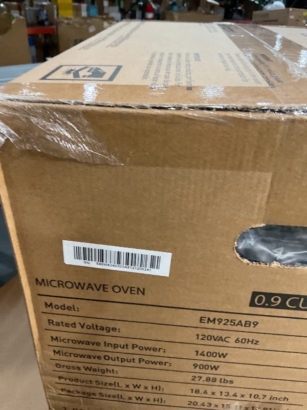 Photo 1 of *** FACTORY SEALED *** BLACK+DECKER Digital Microwave Oven with Turntable Push-Button Door, Child Safety Lock, Stainless Steel, 0.9 Cu Ft