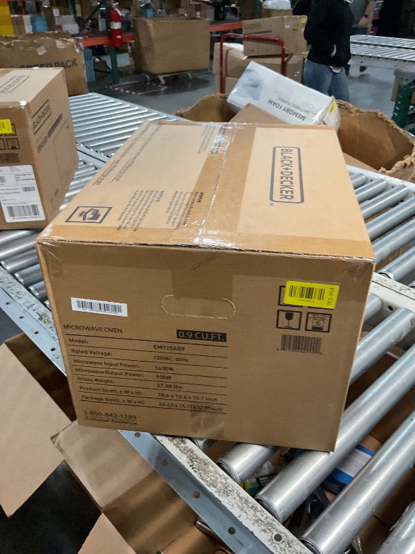 Photo 1 of *** FACTORY SEALED *** BLACK+DECKER Digital Microwave Oven with Turntable Push-Button Door, Child Safety Lock, Stainless Steel, 0.9 Cu Ft