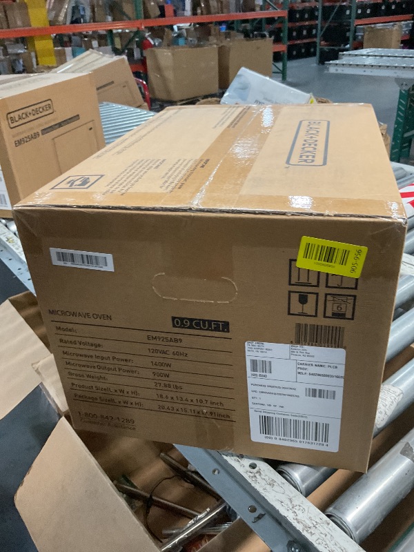 Photo 1 of *** FACTORY SEALED *** BLACK+DECKER Digital Microwave Oven with Turntable Push-Button Door, Child Safety Lock, Stainless Steel, 0.9 Cu Ft