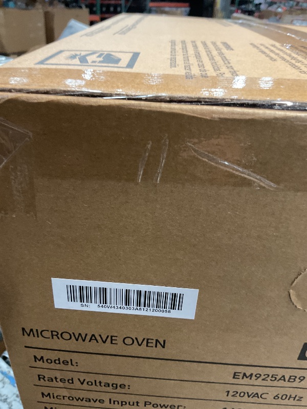 Photo 1 of *** FACTORY SEALED *** BLACK+DECKER Digital Microwave Oven with Turntable Push-Button Door, Child Safety Lock, Stainless Steel, 0.9 Cu Ft