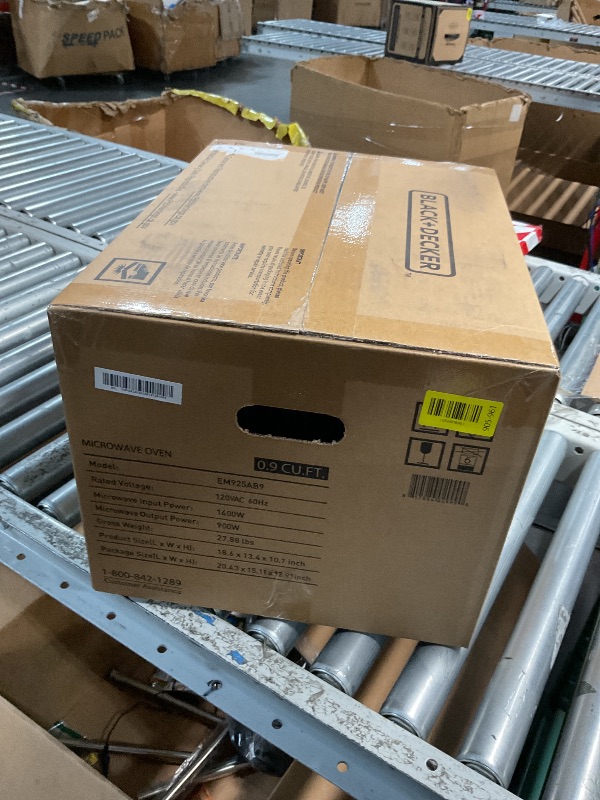 Photo 1 of *** FACTORY SEALED *** BLACK+DECKER Digital Microwave Oven with Turntable Push-Button Door, Child Safety Lock, Stainless Steel, 0.9 Cu Ft