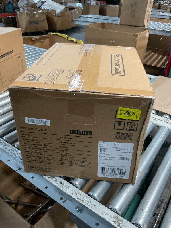 Photo 1 of *** FACTORY SEALED *** BLACK+DECKER Digital Microwave Oven with Turntable Push-Button Door, Child Safety Lock, Stainless Steel, 0.9 Cu Ft