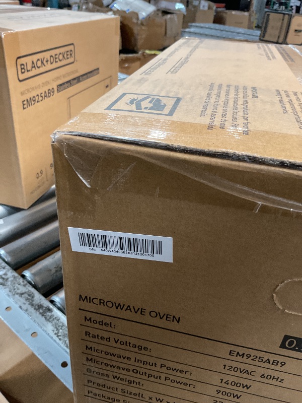 Photo 1 of *** FACTORY SEALED *** BLACK+DECKER Digital Microwave Oven with Turntable Push-Button Door, Child Safety Lock, Stainless Steel, 0.9 Cu Ft