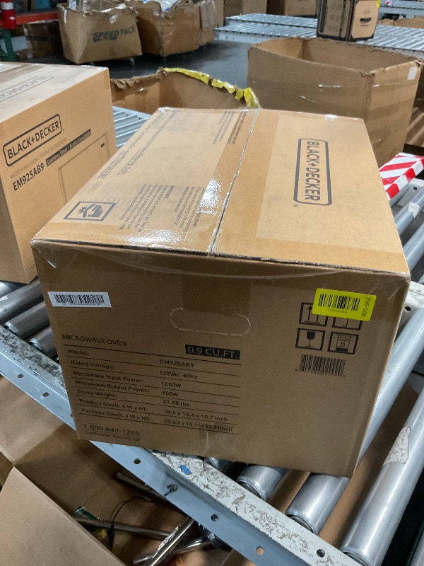 Photo 1 of *** FACTORY SEALED *** BLACK+DECKER Digital Microwave Oven with Turntable Push-Button Door, Child Safety Lock, Stainless Steel, 0.9 Cu Ft