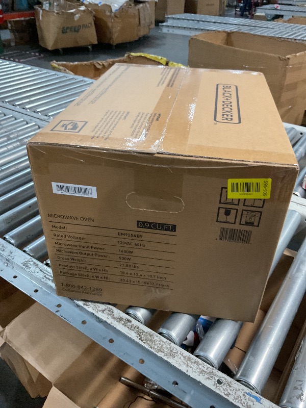 Photo 1 of *** FACTORY SEALED *** BLACK+DECKER Digital Microwave Oven with Turntable Push-Button Door, Child Safety Lock, Stainless Steel, 0.9 Cu Ft