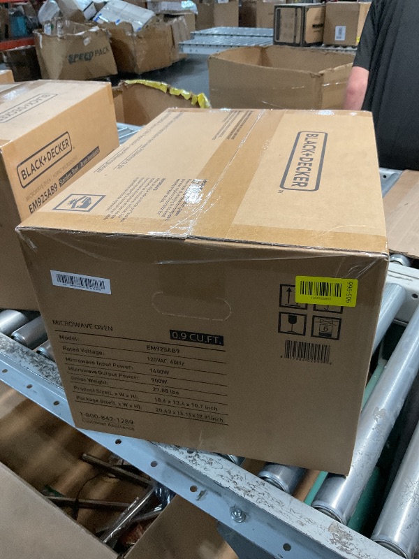 Photo 1 of *** FACTORY SEALED *** BLACK+DECKER Digital Microwave Oven with Turntable Push-Button Door, Child Safety Lock, Stainless Steel, 0.9 Cu Ft