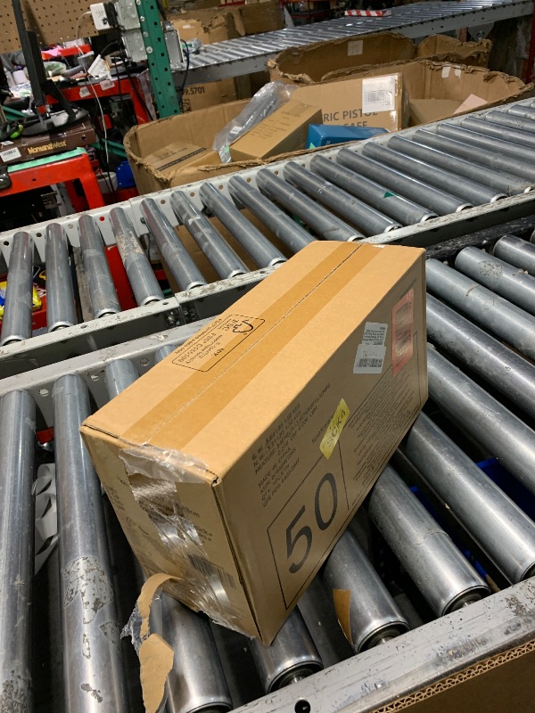 Photo 1 of ***FACTORY SEALED***Amazon Basics Scented Dog and Puppy Pee Pads, 5-Layer Leak-Proof Super Absorbent, Quick-Dry Surface, Potty Training, Regular (22x22"), 50 Count, Blue & White