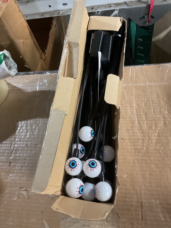 Photo 1 of ***(MINOR DAMAGE/ SEE NOTES FOR DETAILS)***ASMAD Halloween Decorations Outdoor Solar Scary Eyeball Lights, 4Pack 32LEDs Green Eyeball Swaying Firefly Light, Waterproof Halloween Path Lights for Garden/Yard/Patio/Party Decor