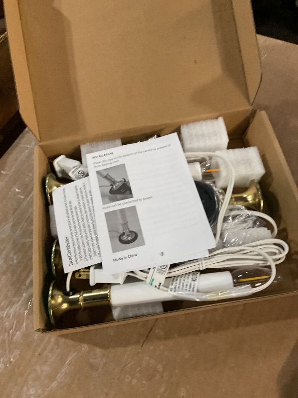 Photo 1 of (one does not work) CHYParty 4Pack Christmas Window Candles with Timer, 9 Inch Plug-in Electric LED Flameless Candles, Warm White Light for Holiday Decor