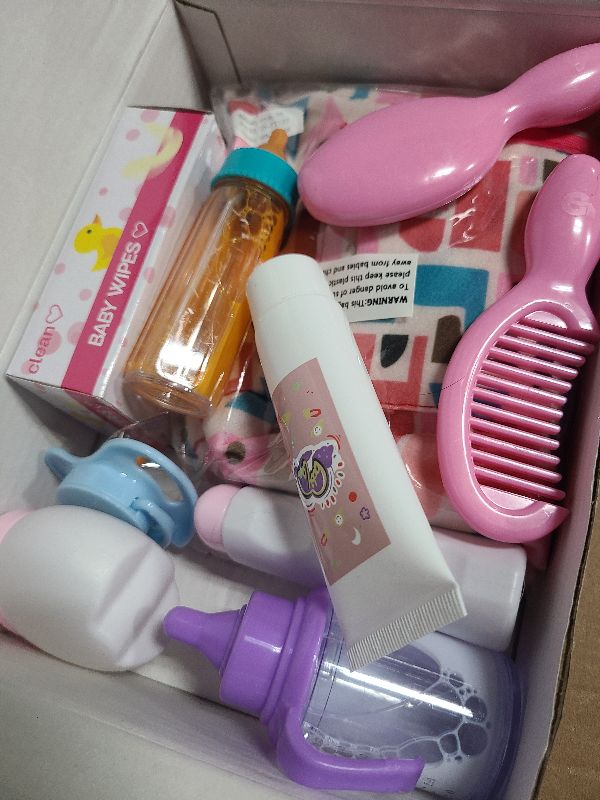 Photo 1 of 14 Pack Baby Doll Accessories, Baby Doll Feeding and Caring Set Includes Diaper Bag, Doll Diapers, Magic Bottle, Changing Mat for Girl Toddler Kid, Babies Pretend Play Set for Birthday Gift Christmas