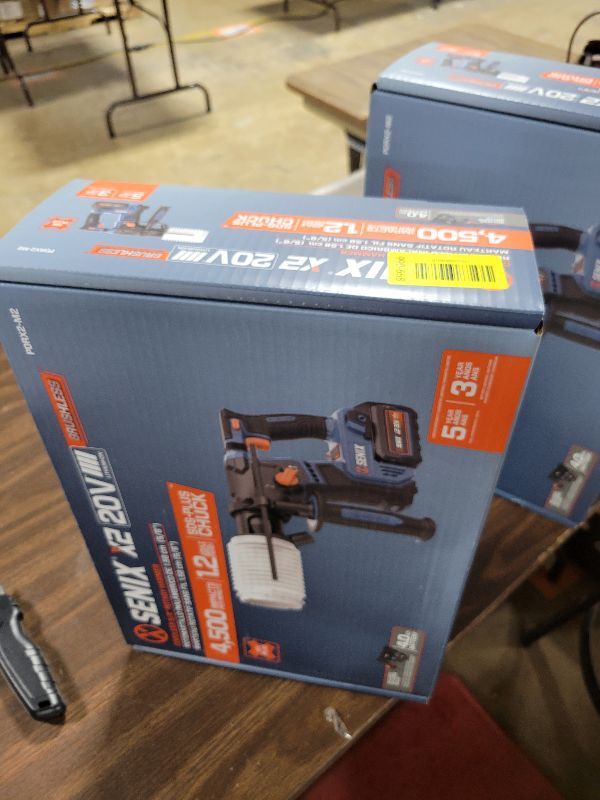 Photo 1 of SENIX X2 20 Volt Max* SDS-Plus Cordless 5/8" Rotary Hammer Drill with Brushless Motor, Auxiliary Handle, Dual Function, & Vibration Control, Includes Battery, Charger, & Storage Bag (PDRX2-M2)