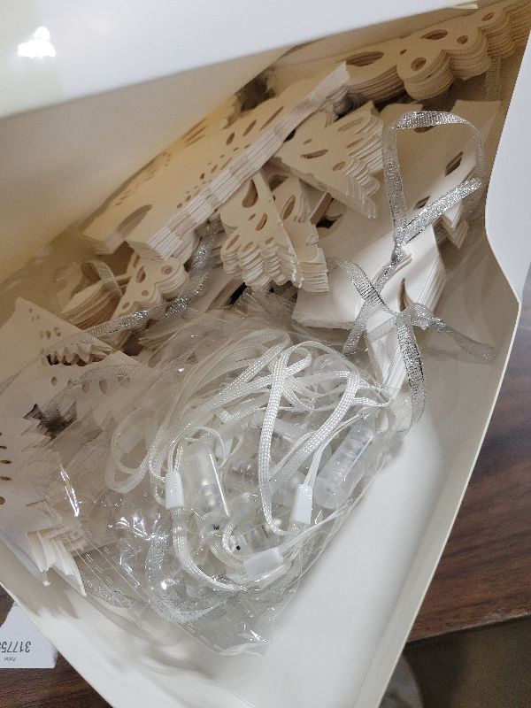 Photo 1 of 12 Pcs Christmas Paper Snowflake Lanterns, 3D Christmas Paper Star Lanterns with LED Lights, 10/12 Inch White Hanging Snowflake Lamps for Xmas Winter Frozen Weddings New Year Party Decorations