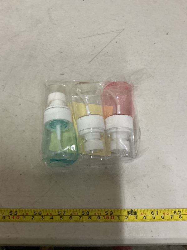Photo 1 of  Mini GIVITASOT 3pack Small Spray Bottle, 1oz Mini Spray Bottles, Empty Travel Spray Bottle, Fine Mist Plastic Spray Bottles (Clear+Green+Pink)