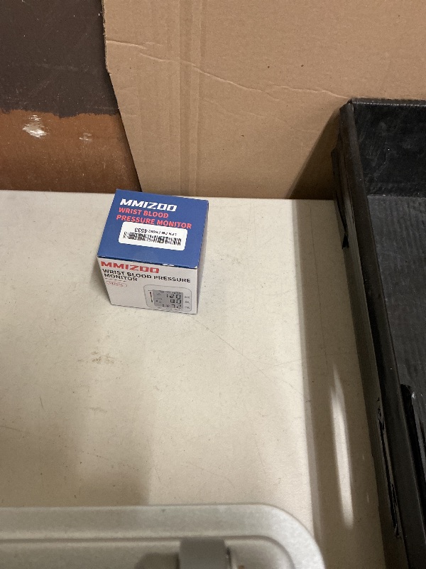 Photo 1 of MMIZOO Wrist Blood Pressure Monitor Large LCD Display BP Machine Adjustable Cuff 5.31-7.68 inch Automatic 99x2 Sets Memory with Carrying Case for Home Use (W1681)