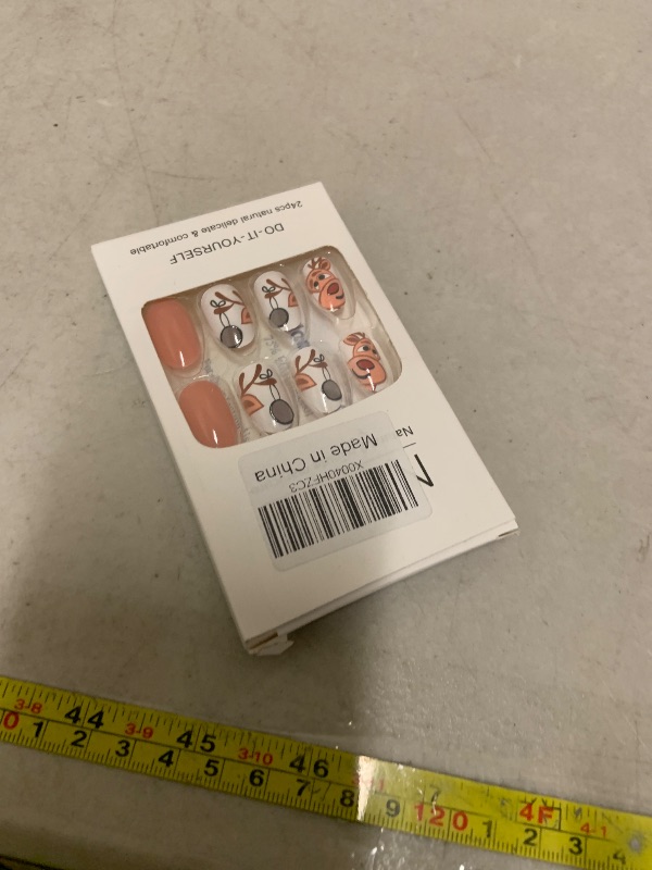 Photo 1 of 24 Pcs Christmas Fake Nails Almond Press on Nails Medium Nails Glossy Light Orange False Nails with Cute Cartoon Reindeer Pattern Designs Full Cover Christmas Press on Nails for Women and Girls