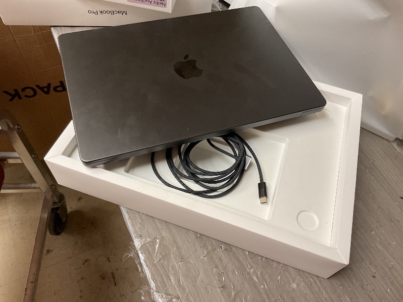 Photo 1 of Apple 2025 MacBook Pro Laptop with M5 chip with 10?core CPU and 10?core GPU: Built for Apple Intelligence, 14.2-inch Liquid Retina XDR Display, 24GB Unified Memory, 1TB SSD Storage; Space Black