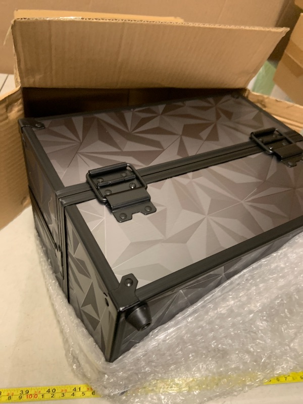 Photo 1 of FRENESSA Makeup Train Case Makeup Case 11.8 Inch Large Cosmetic Box Organizer Travel Storage Professional Make Up Train Carrying Case with 6 Trays Locking Hard Vanity Storage Dark Black