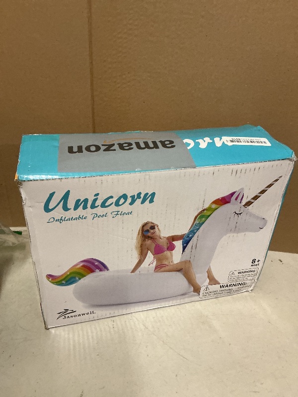 Photo 1 of Jasonwell Giant Inflatable Unicorn Pool Float Floatie Ride On with Fast Valves Large Rideable Blow Up Summer Beach Swimming Pool Party Lounge Raft Decorations Toys for Kids Adults