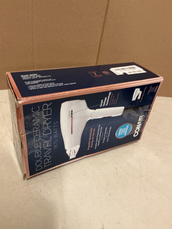 Photo 1 of Conair Hair Dryer, Worldwide Travel Hair Dryer with Smart Voltage Technology and Folding Handle, Includes Concentrator