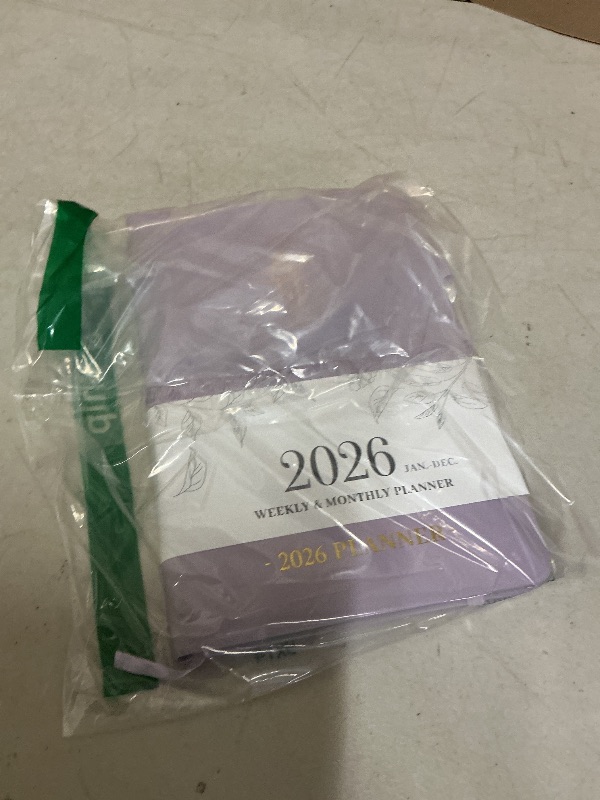 Photo 1 of Planner 2026, Weekly and Monthly Planner with Tabs from Jan 2026 - Dec 2026, A5 Hardcover Academic Calendar with Date for School & Office Schedule, 5.8" x 8.3", Purple